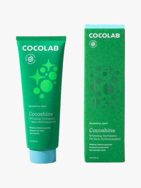  Cocolab Cocoshine Whitening Toothpaste green tube of toothpaste and box on light gray background